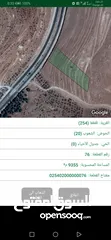  2 ارض مساحه 9 دونم و350 متر على اتوستراد عمان اربد واجهه على الاتوستراد 62 م