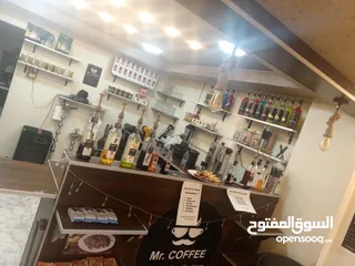  1 كاونتر حرف L مع 10 رفوف وصندوق سقف مع اناره +  طاولة مترين تعليق حيط ،كامل خشب اصلي مقاوم للماء