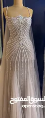  1 فستان سهرة جديد