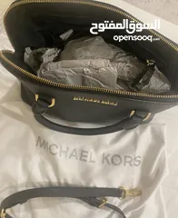  1 حقيبه  ‏Michael kors