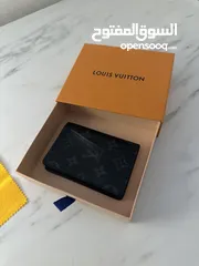  1 Louis Vuitton wallet
