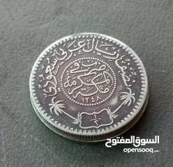  4 عملة معدنية سعودية قديمة