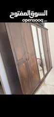  1 خزانه غرفه نوم زان وخزانه جانبيه زان وعليها طبقه زجاج وبوفيه تفصيل من ايكيا مع اضويه