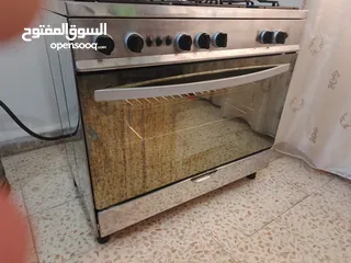  7 غاز تكنو ستانلس 5 عيون 6 مفاتيح مروحة توزيع حرارة و تبريد بالفرن قدحة و امان بالفرن شغال100% منفوض