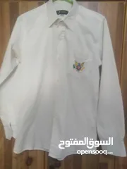  23 قمصان رجالي و وولادي جميع المقاسات ماركة زارا وبولو بأسعار مخفضة القميص ب دينارين