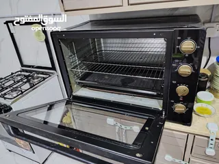  2 فرن كهربائي من نوع هوم اليكترك مستعمل يعمل بحالة ممتازة لكن يوجد مشكلة بسيطة في الباب