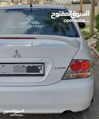  2 ميتسوبيشي لانسر 2013 ماتور 1600 سيارة خالية من اي عيوب بسعر حرق 5000 دينار السعر نهائي