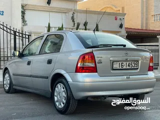  6 ‎أوبل استرا موديل 2001  وارد الوكالة ومالك واحد فقط من الشركة عداد 100الف كيلو فقط