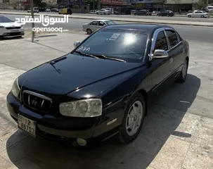  2 هيونداي افانتي xD لون اسود مميز ميتالك  موديل 2000