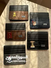  4 محافظ رجالية عصريه