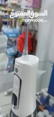  3 جهاز تنظيف الاسنان بالماء المضغوط