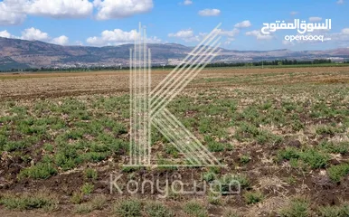  1 أرض 1004م سكني للبيع في رجم عميش