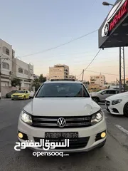  2 فوكس فاجن تيجوان 2012 بنزين متور 2000 تيربو 4x4 فتحة سقف بانوراما فرش بني مميز عداد قليل فحص ممتاز