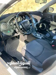  14 مازدا زووم 6 لون أبيض لؤلؤي للبيع موديل 2009