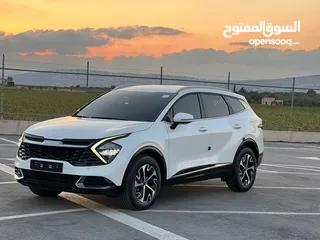  5 كايا سبورتاج /2022 فل بدون فتحة سقف  2x4 ///240Hp بنزين + كهرباء  ( Haybrid) 1600cc