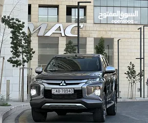  4 ميتسوبيشي L200 2022 لون بني مميزه فحص كامل كرت ابيض 7 جيد اتوماتيك