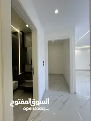  24 شقة طابقية شبه ارضي مع ترس مساحة داخلية 248 متر ومساحة ترس 100 متر باجمل مناطق الجبيهة