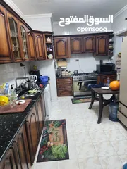  7 شقه ارضيه مع تسويه دوبلكس ضاحية الأمير حسن