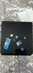  1 Ps4 with two controllers and 4 games including overwatxh ultimate edition