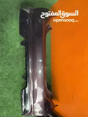  1 طمبون خلفي بريوس سي 2012-2014  اصلي معدل مستعمل بحالة جيده موضوح بصور  Toyota Prius c 2012-2015