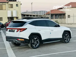  11 هونداي توسان/2024  فل الفل فتحة سقف بانوراما  2x4 ///240Hp بنزين + كهرباء  ( Haybrid) 1600cc