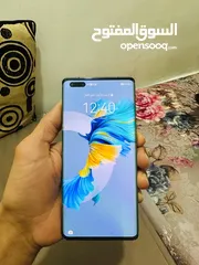  2 ميت 40 برو مع الشاحن معفي ضريبة حمايه في الظهر فيه خبطه في الشاشه لا تأثر على الاستعمال 256جيجا 5G