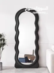  7 مرايا ترند عالمياً... تصميم موجي ومنحوت فخم يخلي أي زاوية تصير قطعة فن جاهزة للتصوير