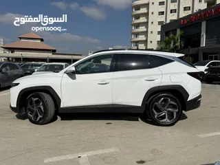  13 هونداي توسان ترخيص 2022 محرك 1600 هايبرد  جير أوتوماتيك 240 حصان