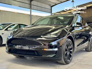  10 Tesla Model Y 2023 ( LONG RANGE DUAL MOTOR ) , 22 الف مايل ، فحص كامل ، ايرباج مغلق