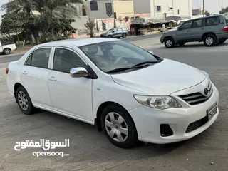  7 Toyota Corolla XLI 1.6L, 2013 Model, Sedan. White color