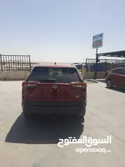  4 تويوتا راف فور XLE موديل 2022 لون خمري داخل جلد اسود عداد قليل