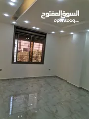  12 شقق 170م+205م للبيع على شارع البترا شرق اربد مول قراند وكازيه الرجوب