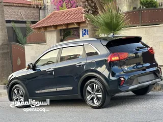  22 كيا نيرو هايبرد 2020 تورنج فل الفل كاش او اقساط غرفه مميزه لون خمري فتحه