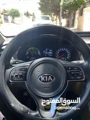  13 كيا K5 هايبرد موديل ال 2018 لون فيراني ميتالك  فحص اربعة جيد ولا ملاحظة فل كامل عدا الفتحة - كاش