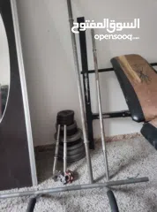  3 اوزان دامبل و بار و تخت  مستعملة للبيع