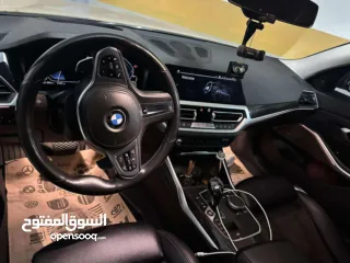  12 BMW 330e plug إن