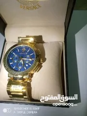  1 Versace wrist watch with gold chain strap