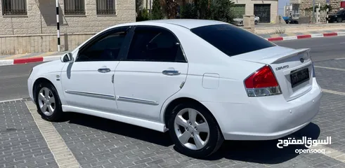  11 كيا سيراتو 2008 ماتور 1600 بنزين اوتومات عدد 2 لون ابيض ولون اسود