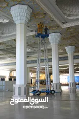  8 Man-lift for maintaining mosques and buildings  منصة العمل الجوية لصيانة المساجد والمباني