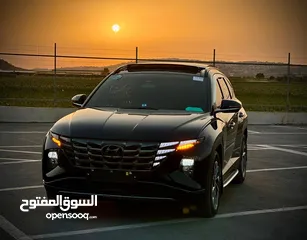  1 هونداي توسان/2022 فل الفل فتحة سقف بانوراما  2x4 ///240Hp بنزين + كهرباء  ( Haybrid) 1600cc