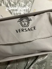  6 Versace long wallet