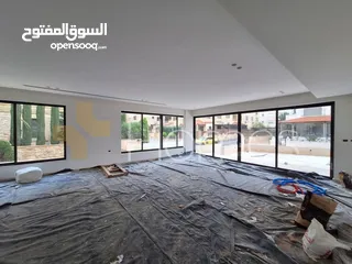  2 شقة ارضية مع ترس للبيع في عبدون بمساحة بناء 250م