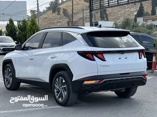  8 هونداي توسان هايبرد ترخيص 2022  بنزين وكهرباء