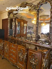  1 طقم كنب مع طاولة سفرة و 2 بوفيه