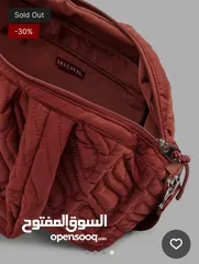  4 حقيبة سكتشرز لون قرميدي