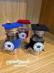  21 علب تخرج شكلاتة وحلويات باشكال وانواع مختلفه