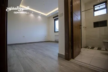  15 شقة طابق ثاني للبيع بأرقى احياء خلدا مشروع 106