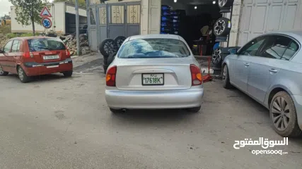  3 سيارة دايو لانوس اوتوماتيك موضيل 2002 متور 1.6 مرخصة مأمنة ، السيارة لعبة