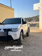  14 l200 موديل  2009 فحص كامل مالك ثاني من الحره ماشيه 226 الف