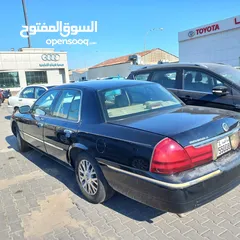  2 فورد جراند ماركيز2003 SL  صبغ  وكالة شرط الفحص